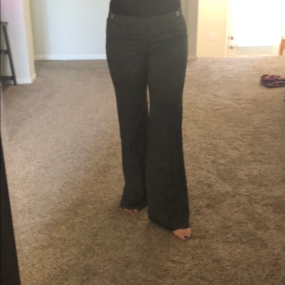 Charcoal gray dress pants.